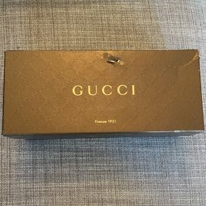 Empty Gucci sandal box